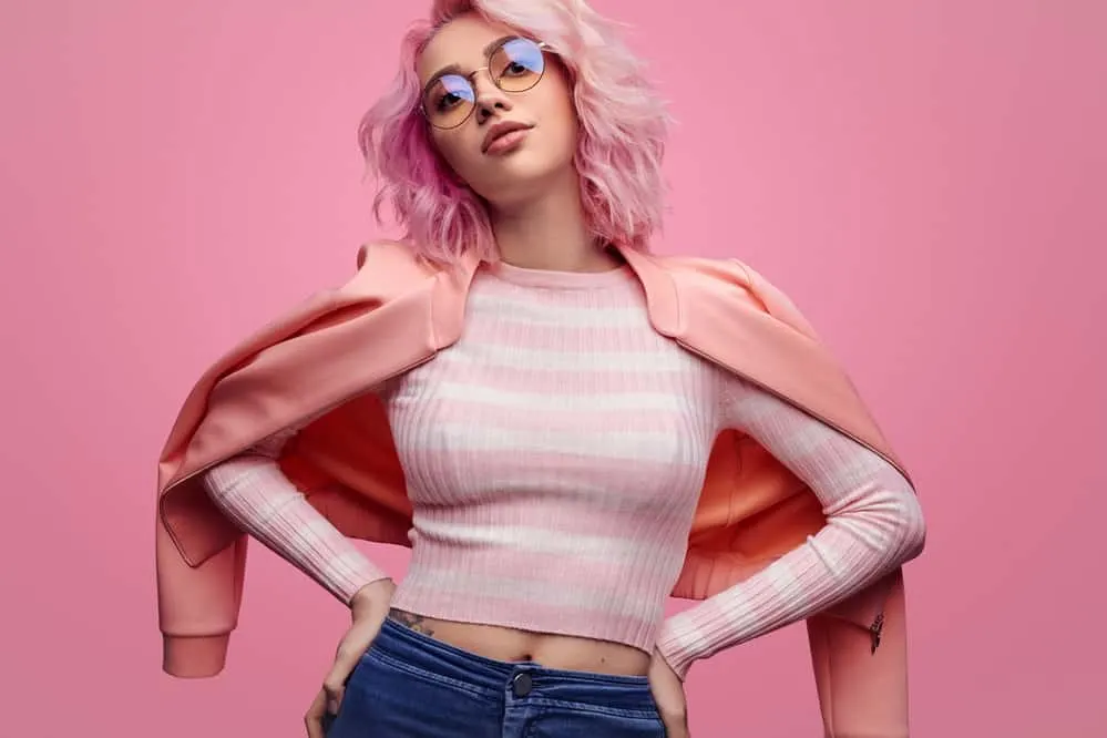 How to Use Wella T50 Toner Before and After: Wella Pink Blossom 1 A beautiful white girl that's naturally blonde is wearing cool-toned bleached hair that's been dyed with Wella toner creating a perfectly even tone.