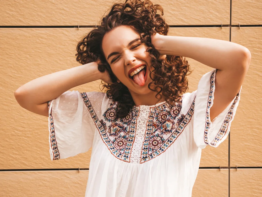 Digital Perm: What Are Digital Perms and How Do They Work? 6 Her hair, once straight and sleek, now boasts captivating waves thanks to the artistry of the hair salon and the wonders of digital perming.