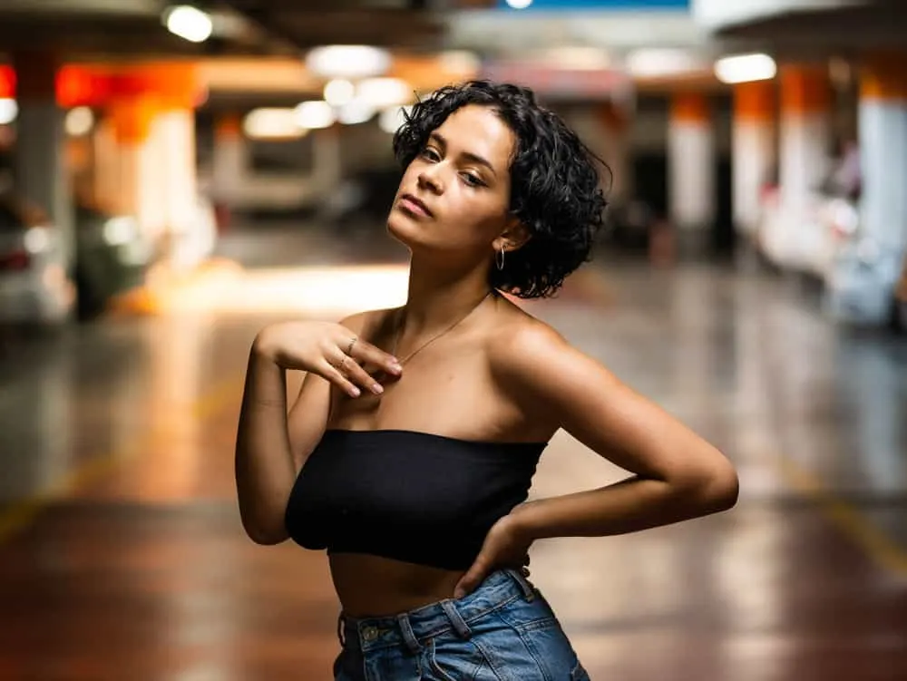 The Bisexual Haircut: How to Create Bi Haircuts & Hairstyles 2 The cute young woman confidently rocks one of our favorite bisexual haircuts, a trendy haircut often worn by bisexual women that are comfortable in their own skin.