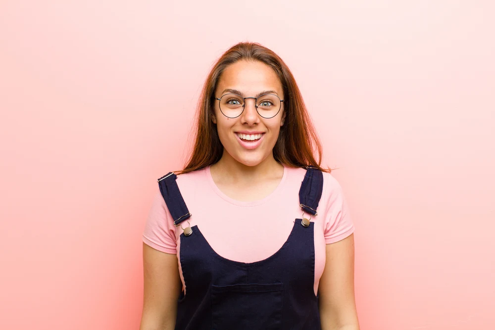 How to Grow and Style Waist Length Hair: Step-By-Step Guide 4 Her waist-length natural hair flows gracefully down her back, a testament to the time and effort she puts into caring for her natural hair.
