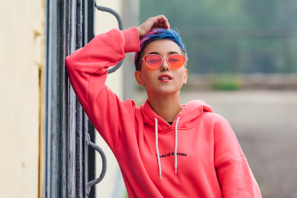 Enby Haircuts: 16 Cute Enby Haircut Styles for All Hair Types 6 The androgynous pixie she wears beautifully complements her face shape, enhancing her prominent cheekbones.
