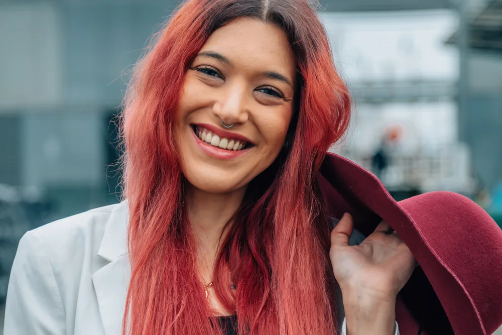 Aesthetic E-Girl Hair: Color Ideas, Hairstyles, and Haircuts 7 Neon green butterfly clips adorn her black hair, adding a pop of color and playfulness to her e-girl aesthetic.