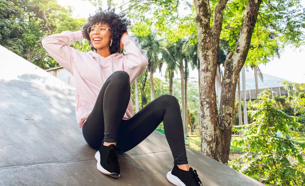 From short curly hairstyles to long and luscious locks, this black girl proves that curly hair can be versatile and beautiful.