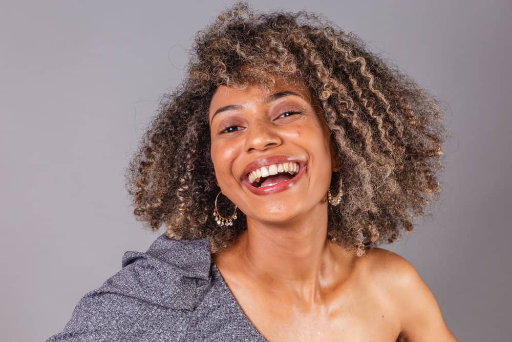 Despite common misconceptions, she embraces her beautiful grey hair and celebrates its unique charm.