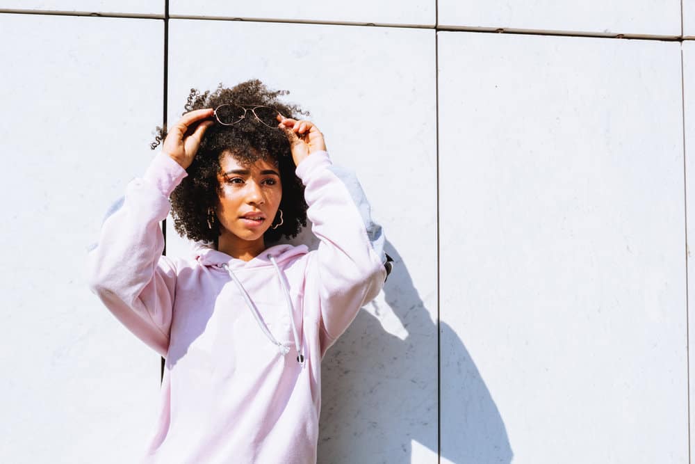 From soft curls to tight coils, this girl's curly hairstyle celebrates the beauty and diversity of curly hair textures.