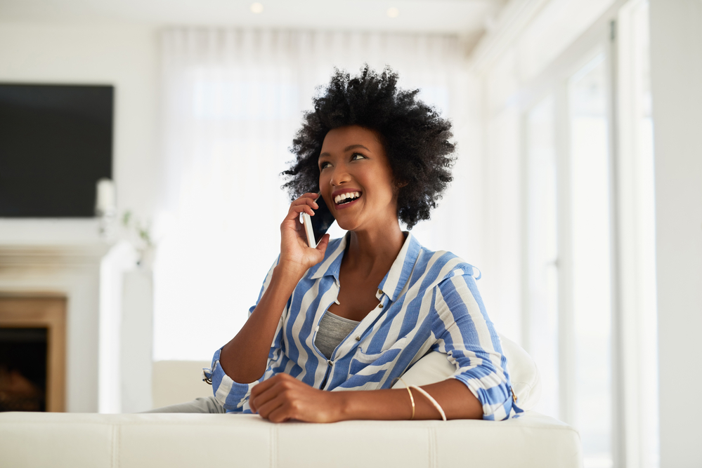 The wide-tooth comb is her essential tool for managing her curly perm and will prevent hair breakage.