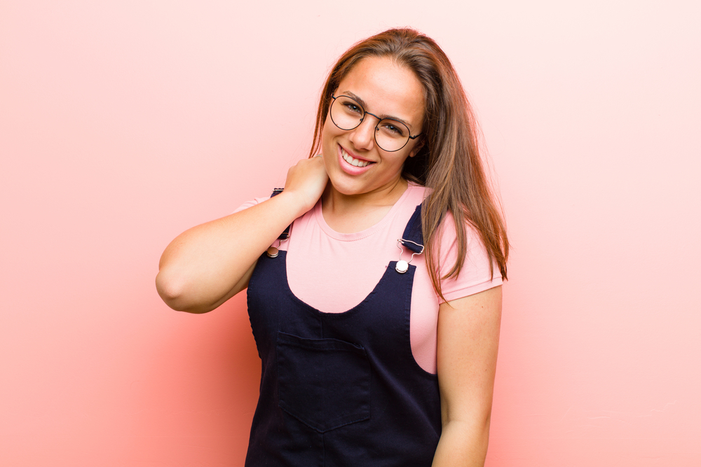 While she occasionally uses hot tools like a curling iron to enhance her curls, she prioritizes protecting her hair from heat damage.