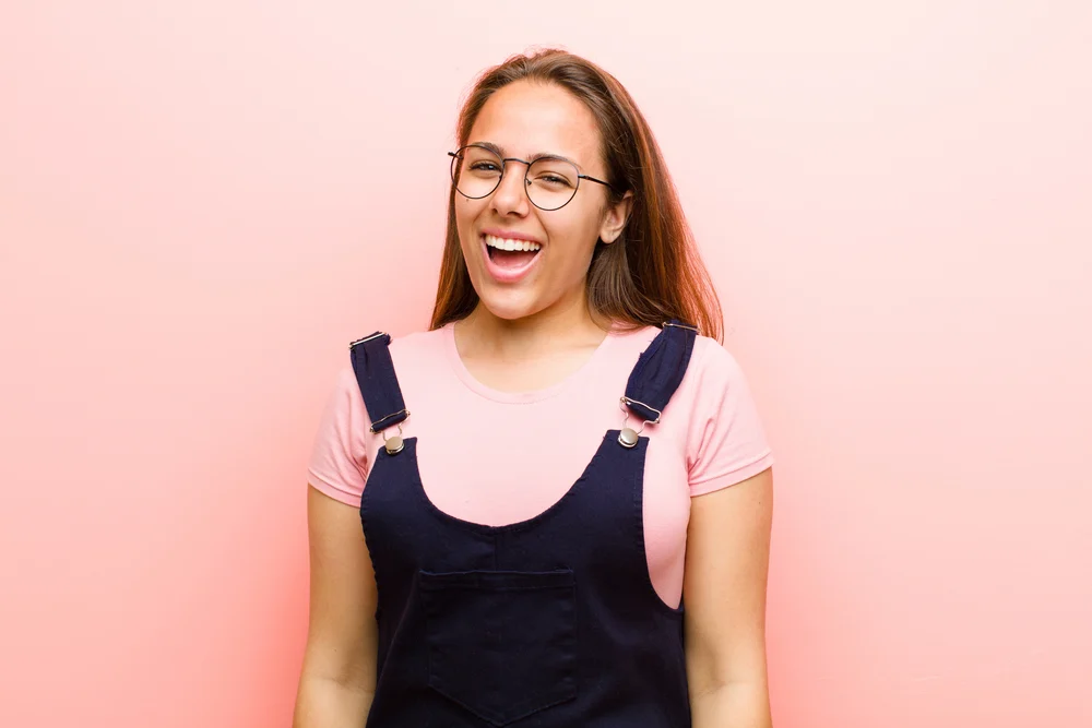 How to Grow and Style Waist Length Hair: Step-By-Step Guide 10 The top half of her hair is left natural, allowing her natural texture to shine through, while the straight extensions add length and volume.