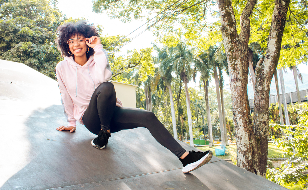 As a black woman, she embraces natural hairstyles that showcase her unique beauty and the versatility of her curly hair.