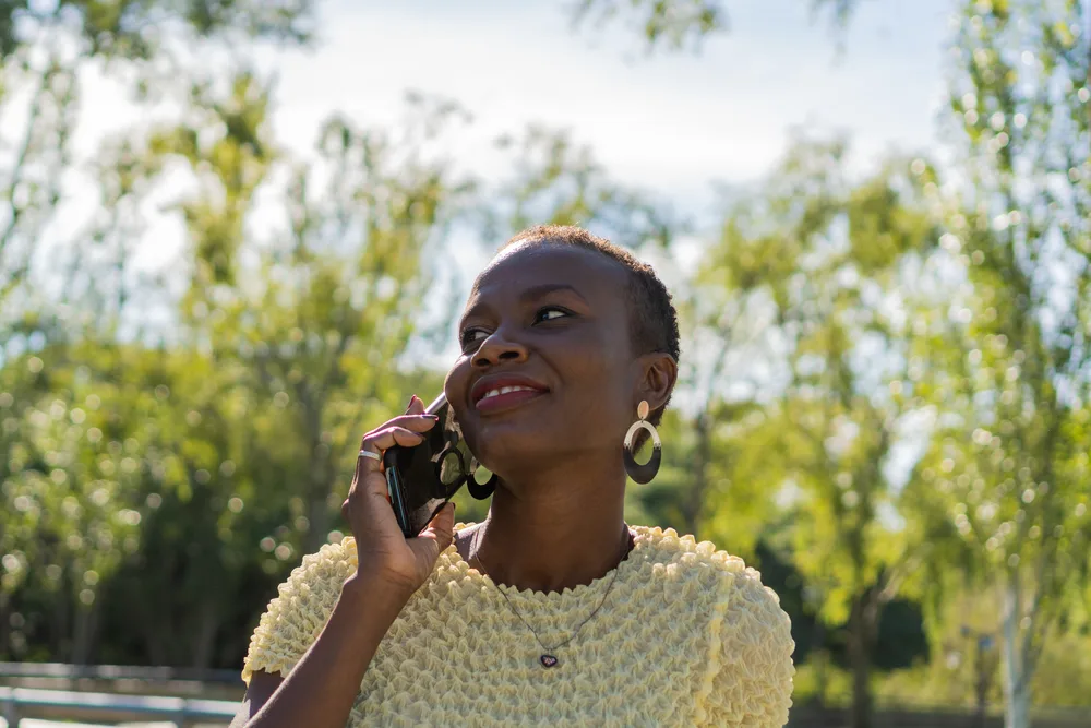 23 Short Hairstyles for Women over 60: Hair Styles & Haircuts for Women 20 Adorned with a gorgeous haircut, the African American woman proudly showcases her naturally wavy hair, a testament to her beauty and individuality.