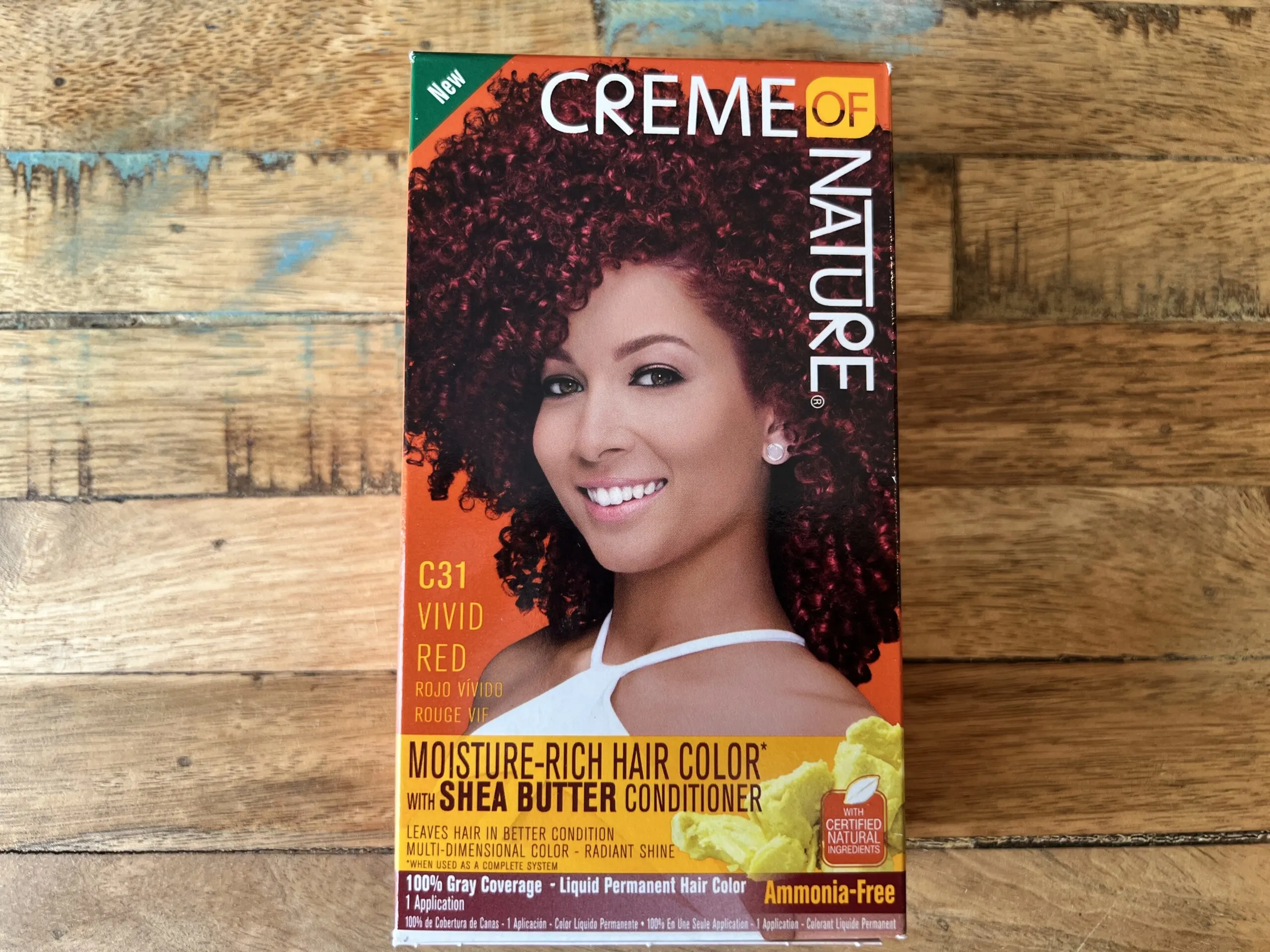 This box of ammonia-free Creme of Nature C31 Vivid Red is a moisture-rich hair color that includes a shea butter conditioner leaving your hair in better condition. The liquid-permanent hair color provides 100% gray coverage and uses certified natural ingredients.