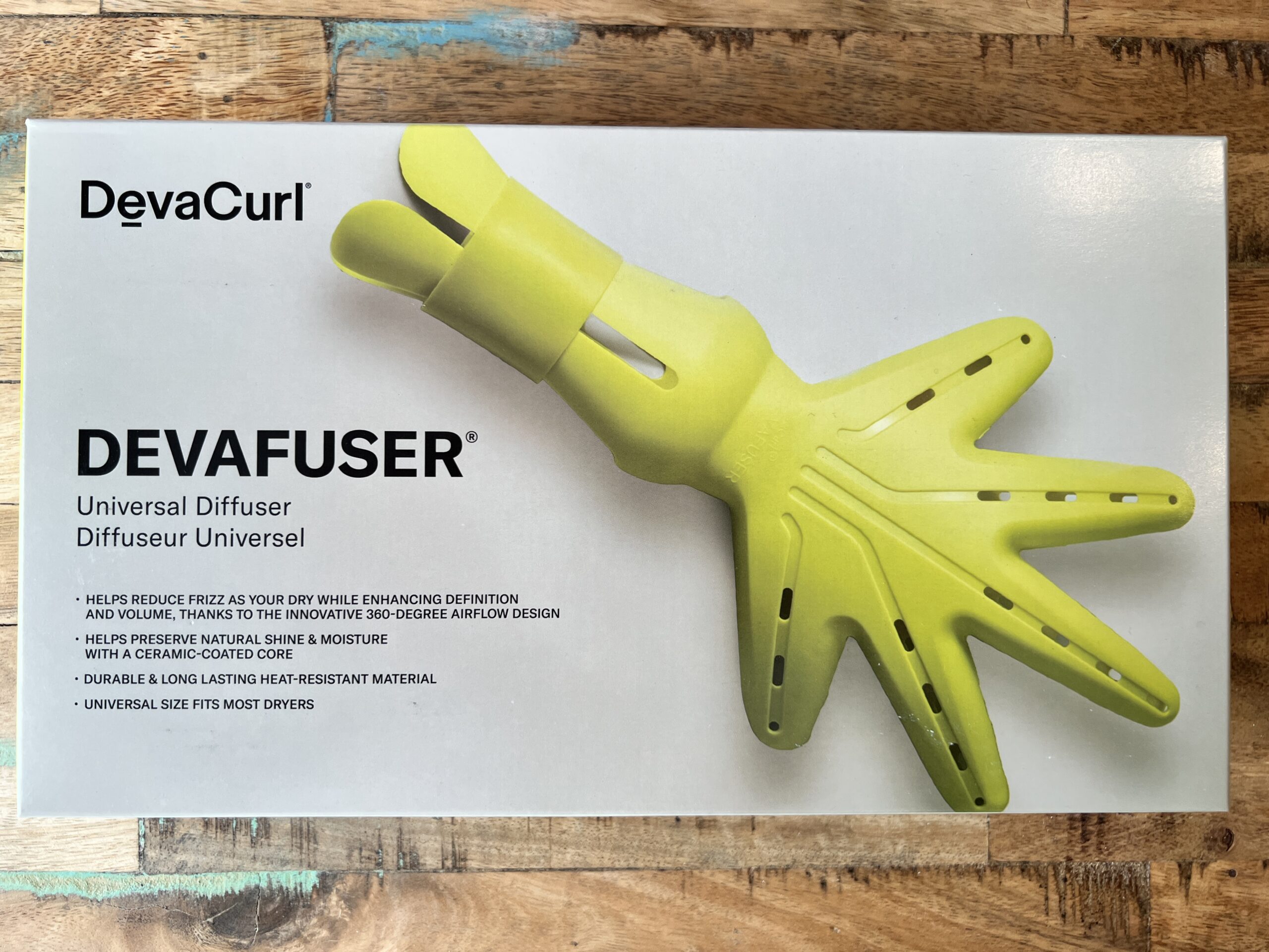 DevaCurl: Devafuser - Universal Diffuser that helps reduce frizz as your hair drys while enhancing curl definition and volume due to its innovative 360-degree airflow design.