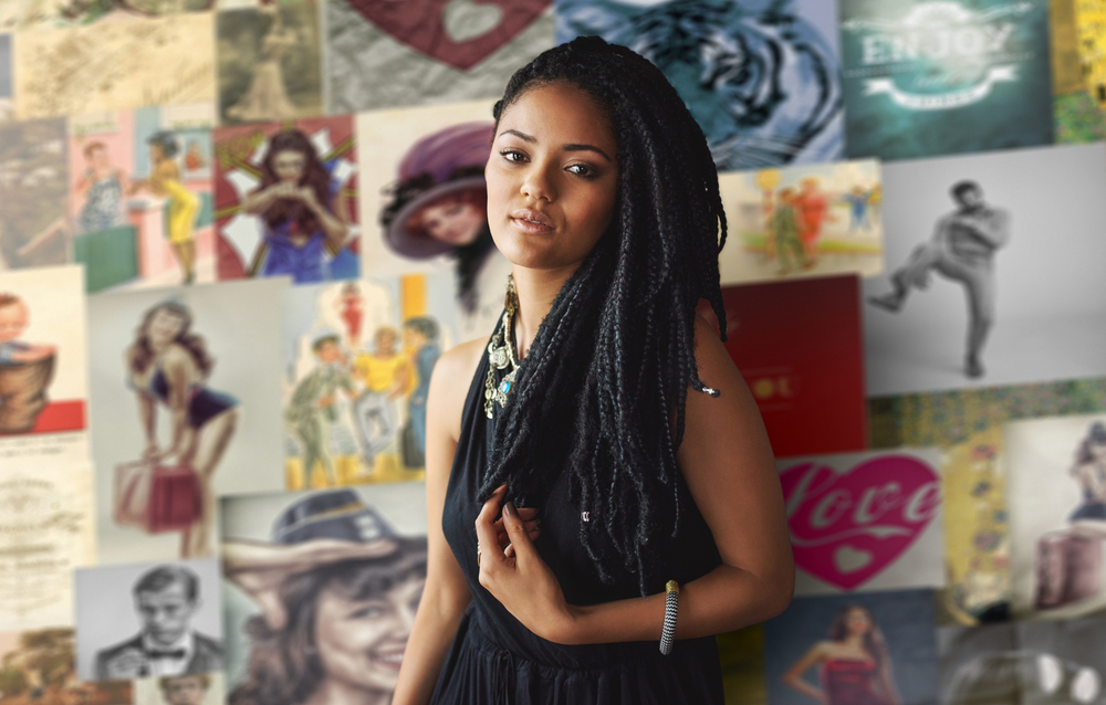 A beautiful black woman with an oval face shape wearing weave and hair extensions on type 4 natural hair shows the beauty of different hair lengths.