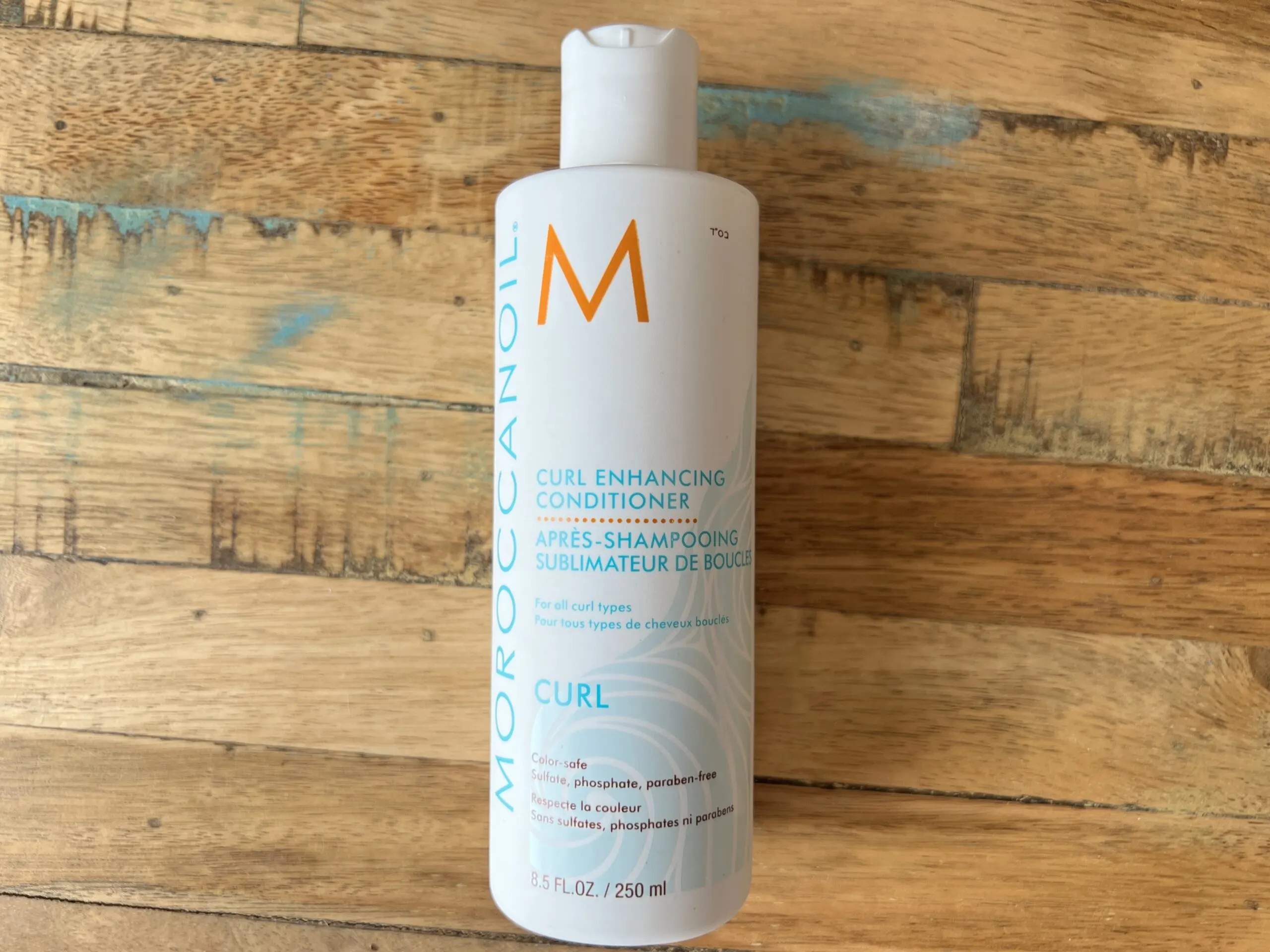 Moroccanoil Curl Enhancing Conditioner for all curl types is color-safe, sulfate, phosphate, and paraben-free.