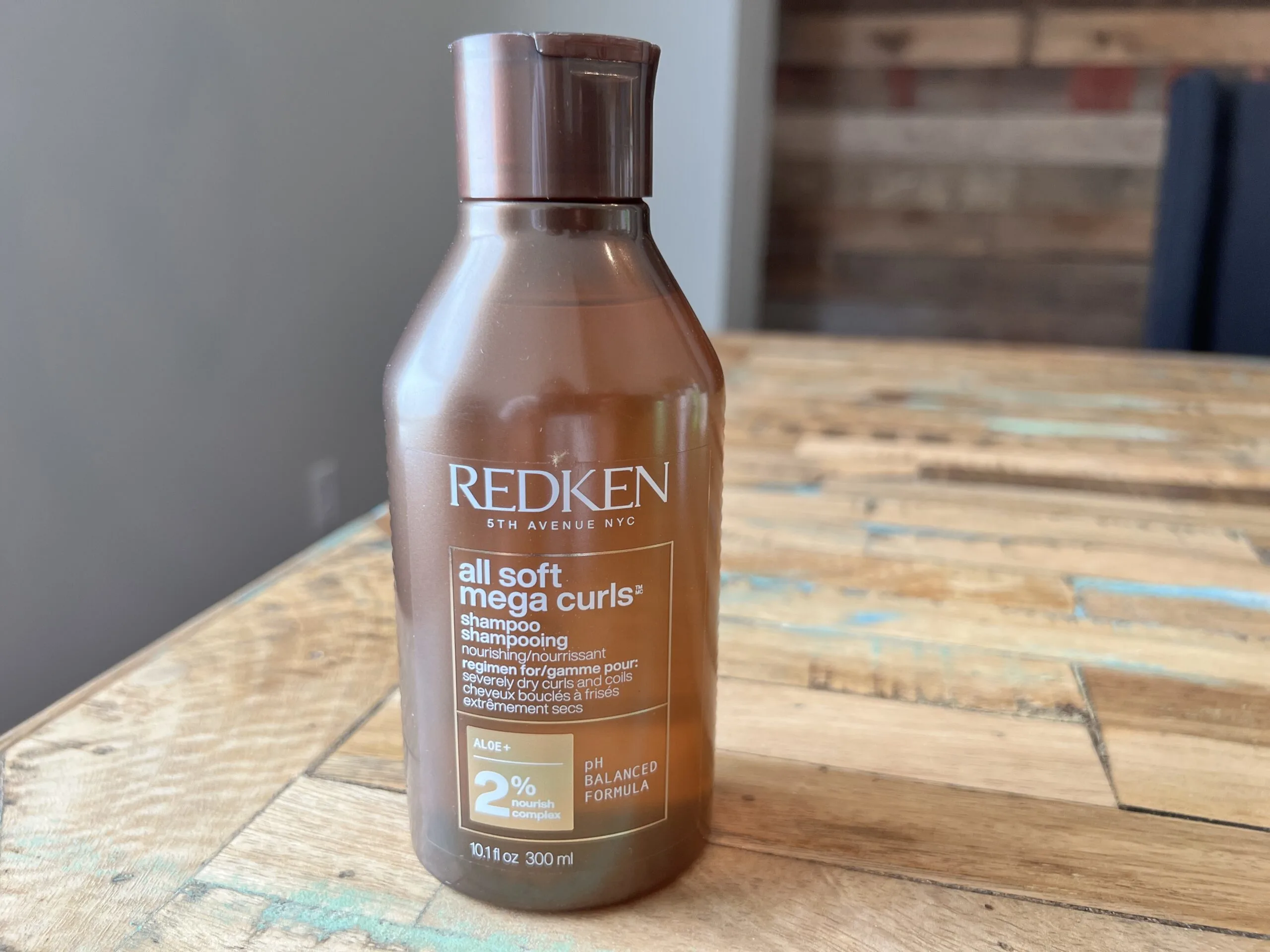 Redken 5th Avenue NYC: All Soft Mega Curls nourishing shampoo with a pH-balanced formula.