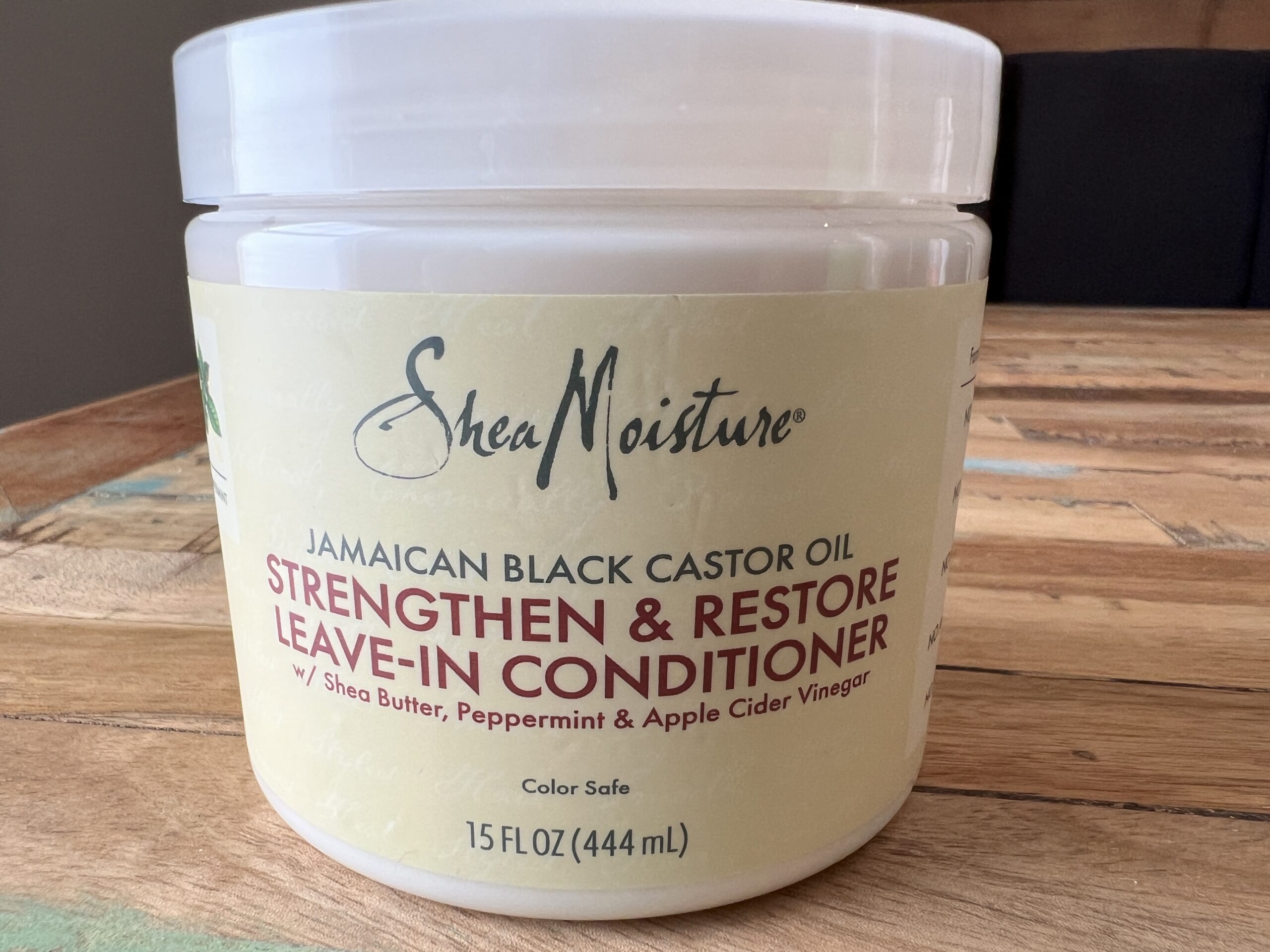 Shea Moisture Jamaican Black Castor Oil Strengthen & Restore Leave-in Conditioner includes shea butter, peppermint, and apple cider vinegar.