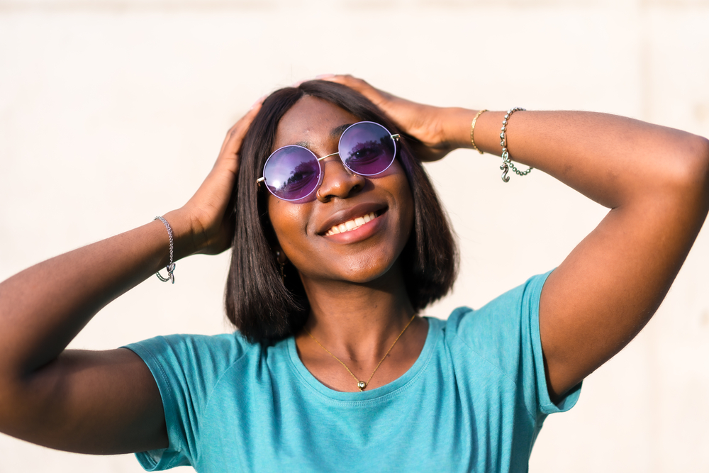 Stylish female wearing a fashionable chin length bob hairstyle.