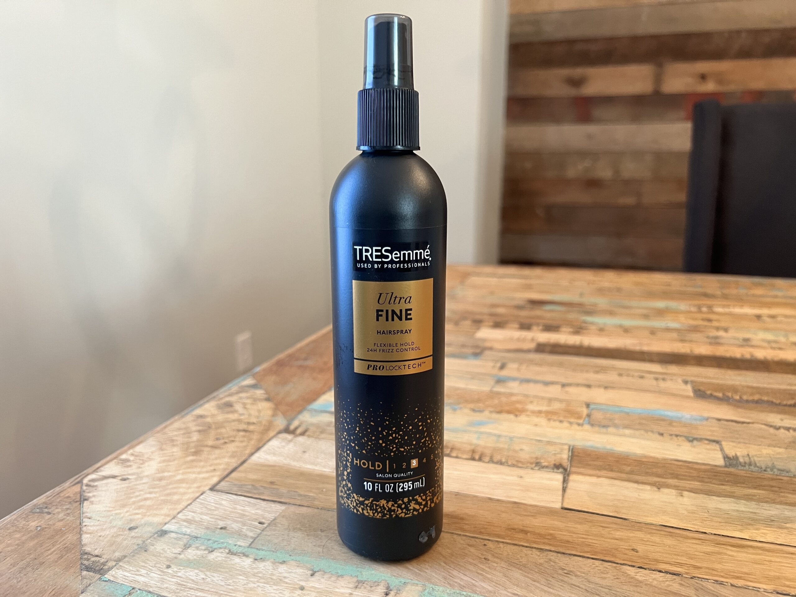 TRESemmé Used by Professionals Ultra Fine Hairspray with 24-hour frizz control.