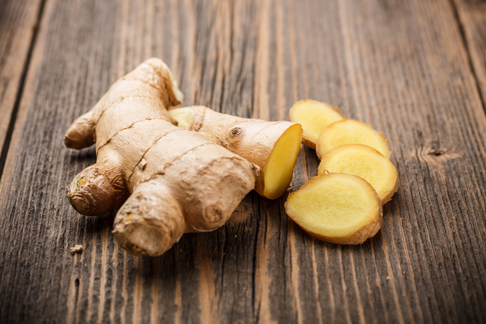 Ginger root with a distinctive, spicy appearance, symbolizing the origin of the term 'ginger' for redheads.