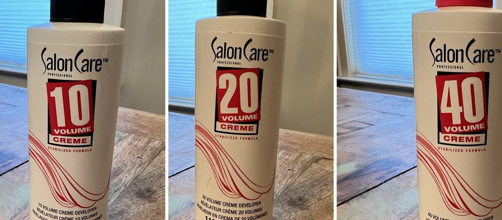 Three Salon Care creme developer bottles side by side, marked 10, 20, and 40 volume